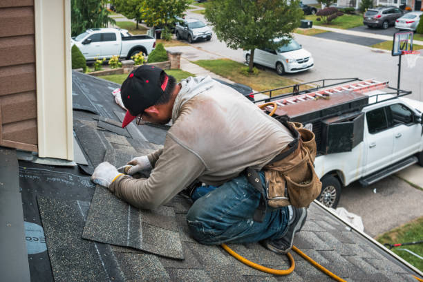 Professional Flat Roof Repair technician working in Browning, MO